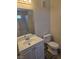 Cozy bathroom featuring a single sink vanity with modern fixtures and a toilet at 3953 Rebecca Raiter Ave # 202, Las Vegas, NV 89110