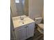 Bright bathroom featuring a single sink vanity and toilet at 3953 Rebecca Raiter Ave # 202, Las Vegas, NV 89110