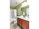 Full bathroom with a tub/shower combo, vanity with a sink and tiled floors at 41 Stablewood Ct, North Las Vegas, NV 89084