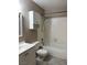 Clean bathroom featuring a tub-shower combo, a white vanity and medicine cabinet at 461 N Lamb Blvd # H, Las Vegas, NV 89110
