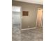 Bedroom featuring tile flooring, neutral walls, and access to a walk-in closet at 461 N Lamb Blvd # H, Las Vegas, NV 89110