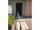 Inviting entrance with a security gate and landscaped pathway at 461 N Lamb Blvd # H, Las Vegas, NV 89110