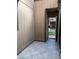 The entry of this home features tiled flooring, a security door, and access to the main living areas at 461 N Lamb Blvd # H, Las Vegas, NV 89110