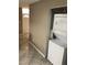 Laundry area featuring stacked washer and dryer appliances at 461 N Lamb Blvd # H, Las Vegas, NV 89110