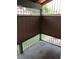 Enclosed patio with a concrete floor, metal railings, and partial privacy screen, offering a private outdoor space at 461 N Lamb Blvd # H, Las Vegas, NV 89110