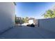 Spacious backyard showcasing a refreshing pool, lounge chairs, and privacy fencing at 7800 Four Seasons Dr, Las Vegas, NV 89129