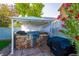 Well-appointed outdoor kitchen with a built-in grill, countertop space, and a charming gazebo at 7800 Four Seasons Dr, Las Vegas, NV 89129