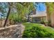 Lush backyard featuring a well-manicured lawn and lovely landscaping, perfect for outdoor enjoyment at 8541 Heather Downs Dr, Las Vegas, NV 89113