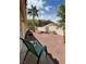 A low maintenance gravel patio with trees and desert landscaping at 855 N Stephanie St # 112, Henderson, NV 89014