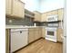 Kitchen featuring bright lighting, stainless steel appliances and light-colored cabinetry at 855 N Stephanie St # 112, Henderson, NV 89014