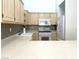 Kitchen featuring bright lighting, stainless steel appliances and light-colored cabinetry at 855 N Stephanie St # 112, Henderson, NV 89014