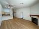 Bright living area with wood flooring, fireplace and easy kitchen access at 855 N Stephanie St # 112, Henderson, NV 89014