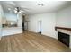 Bright living area with wood flooring, fireplace and easy kitchen access at 855 N Stephanie St # 112, Henderson, NV 89014