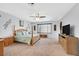 Large bedroom with a four-poster bed, neutral tones and ample natural light at 8828 Monte Oro Dr, Las Vegas, NV 89131