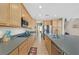 Spacious kitchen boasting wood cabinets, stainless steel appliances, and generous counter space at 8828 Monte Oro Dr, Las Vegas, NV 89131