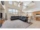 Bright and airy living room with large windows and a view of the backyard at 8828 Monte Oro Dr, Las Vegas, NV 89131