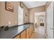 Butler's pantry with ample counter space and wood cabinetry provides great utility at 8828 Monte Oro Dr, Las Vegas, NV 89131