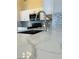 Bright kitchen showcasing white marble countertops and stainless steel faucet fixture at 124 Winley Chase Ave, North Las Vegas, NV 89032