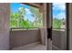 Balcony overlooking lush landscaping, trees, and blue skies at 2001 Quarry Ridge St # 207, Las Vegas, NV 89117