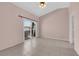 Bedroom with tiled floor and sliding glass door leading to a balcony at 2001 Quarry Ridge St # 207, Las Vegas, NV 89117