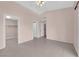 Bedroom with tile floors and an open closet at 2001 Quarry Ridge St # 207, Las Vegas, NV 89117