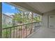 Balcony with a view of the landscaped community grounds and mature trees at 2819 Bluebonnet Dr # 6, Henderson, NV 89074