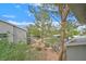 A tranquil community area with lush trees, well-maintained landscaping, and a walking path at 2819 Bluebonnet Dr # 6, Henderson, NV 89074