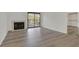 Inviting living room features a fireplace and a sliding glass door leading to the outside at 2819 Bluebonnet Dr # 6, Henderson, NV 89074