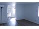 Bright living room with wood laminate floors and natural lighting at 3425 Trilogy Dr, Las Vegas, NV 89108