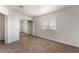 Bedroom with a window, and a closet with mirrored doors, offering ample storage space at 3508 Rio Robles Dr # A, North Las Vegas, NV 89030
