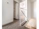Upstairs hallway featuring carpeted floors and a view into a bedroom at 3508 Rio Robles Dr # A, North Las Vegas, NV 89030