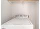 Laundry room featuring a white Whirlpool washer with shelf at 3508 Rio Robles Dr # A, North Las Vegas, NV 89030