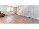 Tile flooring in living room with staircase access and natural light at 3508 Rio Robles Dr # A, North Las Vegas, NV 89030