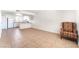 Open living room and kitchen area with tile flooring and ample natural light at 3508 Rio Robles Dr # A, North Las Vegas, NV 89030