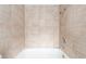 A shower area in bathroom featuring light tile surround and shower head at 3508 Rio Robles Dr # A, North Las Vegas, NV 89030
