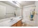 Bathroom featuring a vanity with mirror, toilet, tub, and tiled floors at 3728 Ashling St, Las Vegas, NV 89129