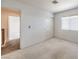 Bedroom featuring neutral carpet, a window, and a sliding door closet at 3728 Ashling St, Las Vegas, NV 89129