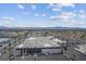 Commercial area with Speed sign on building, visible mountains and clear blue sky at 4381 W Flamingo Rd # 1109, Las Vegas, NV 89103