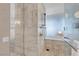 Contemporary bathroom highlighting a glass-enclosed shower and stylish marble tiling at 4381 W Flamingo Rd # 1109, Las Vegas, NV 89103