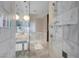 Elegant bathroom showcasing glass shower doors, modern fixtures, and a marble countertop sink at 4381 W Flamingo Rd # 1109, Las Vegas, NV 89103