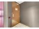 A brown apartment door in the hallway at 4381 W Flamingo Rd # 1109, Las Vegas, NV 89103