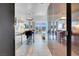 Modern kitchen with stainless steel appliances and stylish breakfast bar overlooking the bedroom at 4381 W Flamingo Rd # 1109, Las Vegas, NV 89103