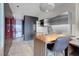 Modern kitchen features stainless steel appliances, stylish cabinets, and a compact breakfast bar at 4381 W Flamingo Rd # 1109, Las Vegas, NV 89103