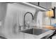 Close-up of the modern stainless steel kitchen sink with stylish faucet at 4381 W Flamingo Rd # 1109, Las Vegas, NV 89103