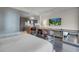 Relaxing apartment layout featuring a kitchenette, TV, built in desk, and modern decor at 4381 W Flamingo Rd # 1109, Las Vegas, NV 89103