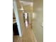Neutral hallway with hardwood floors at 4484 Warbonnet Way, Las Vegas, NV 89147