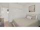 Comfortable bedroom features neutral tones, carpet flooring and sliding closet doors at 5692 Tinar St, Las Vegas, NV 89113