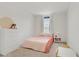 bedroom featuring a bright window and simple furniture for a cozy and playful atmosphere at 5692 Tinar St, Las Vegas, NV 89113