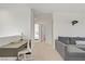 Loft area with desk, chair, and sofa; ideal for study and relaxation at 5692 Tinar St, Las Vegas, NV 89113
