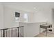 Bright loft space with natural lighting and a small desk with chair at 5692 Tinar St, Las Vegas, NV 89113